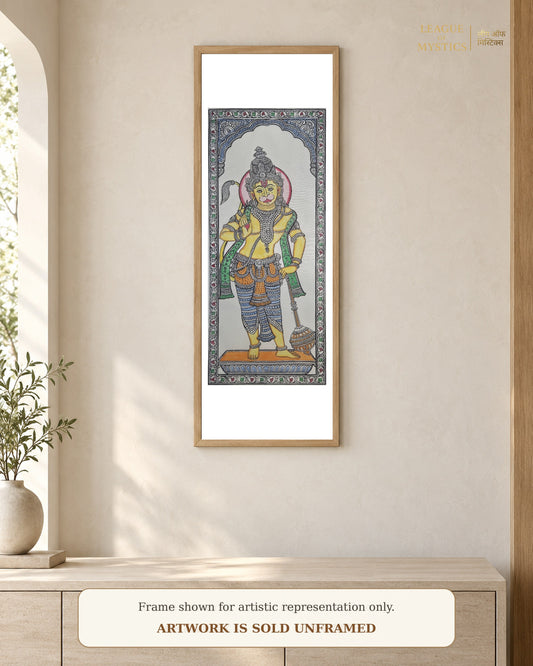 Hanuman Ji Pattachitra shown framed on a wall, marigold colourway