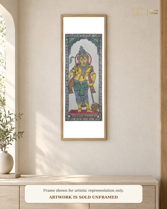 Hanuman Ji Pattachitra shown framed on a wall, amber colourway