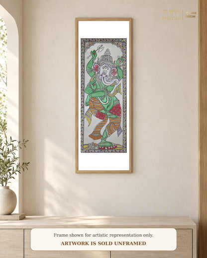 Dancing Ganesha Pattachitra shown framed on a wall, emerald green colourway