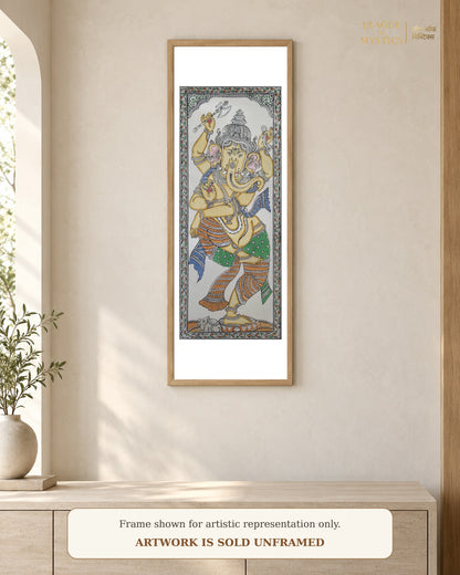 Dancing Ganesha Pattachitra shown framed on a wall, ivory gold colourway