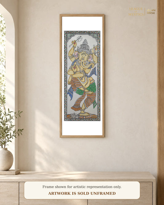 Dancing Ganesha Pattachitra shown framed on a wall, ivory gold colourway