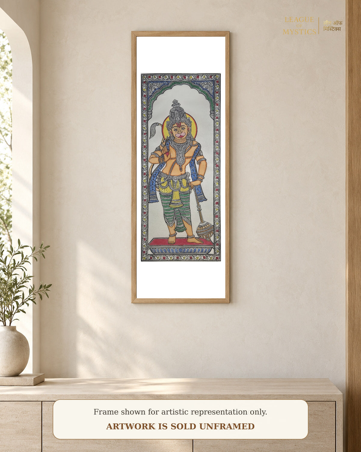 Hanuman Ji Pattachitra shown framed on a wall, vermilion colourway