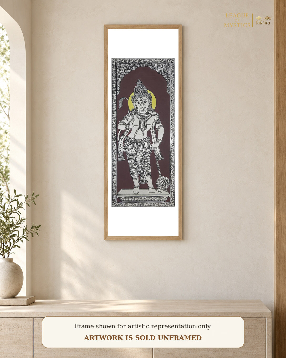 Hanuman Ji Pattachitra shown framed on a wall, wine maroon colourway